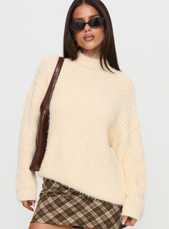 side view of model wearing Princess Polly Abott Sweater Butter Longline Jumpers Jumpers 