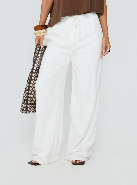 Crafted from the Parklea Pants White Petite in womens-regular-pants with high-rise waist side view of model wearing Princess Polly