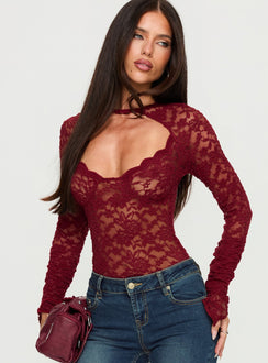 front view of model wearing Princess Polly Giallo Long Sleeve Bodysuit Burgundy Long Sleeve Tops Bodysuit 