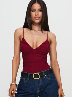 front view of model wearing Princess Polly Merril Bodysuit Maroon Sleeveless Bodysuit 