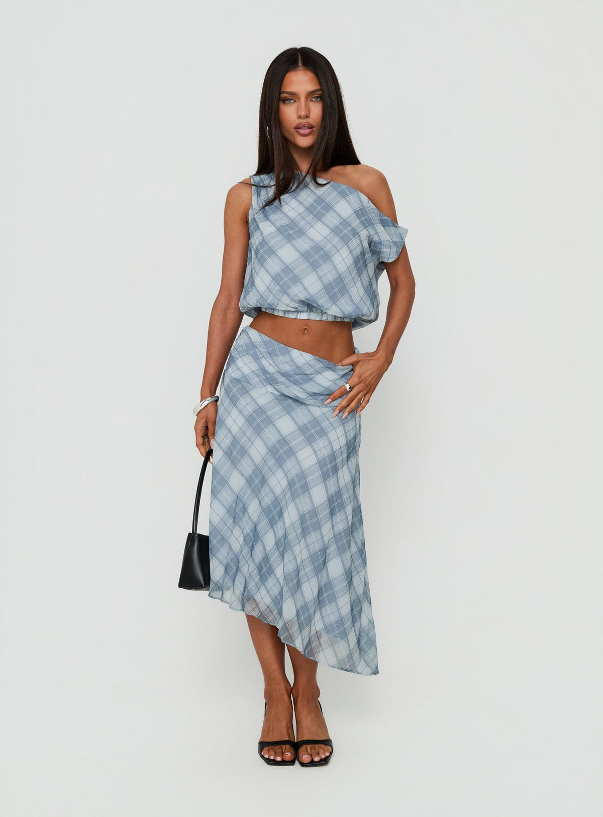 Elevate your wardrobe with the Sabbine Asymmetrical Midi Skirt Blue Check womens-skirts featuring midi length Princess Polly