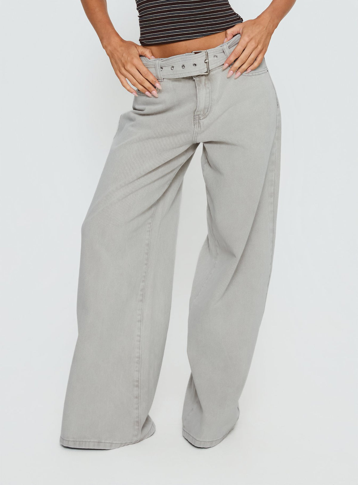 back view of model wearing Princess Polly Katlin Mid Rise Wide Leg Buckle Detail Jeans Grey Wash Mid Rise Jeans Jeans 