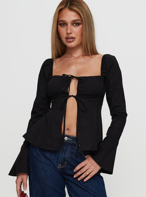 front view of model wearing Princess Polly Lilibette Tie Up Long Sleeve Top Black Full Sleeves Square Neck 