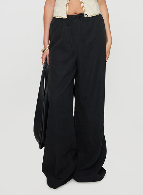 side view of model wearing Princess Polly Barbieri Pants Black High Rise Pants Pants 