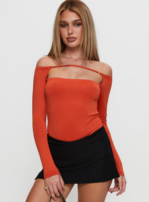 front view of model wearing Princess Polly Degree Of Seperation Buckle Detail Long Sleeve Bodysuit Orange Long Sleeve Tops Bodysuit 