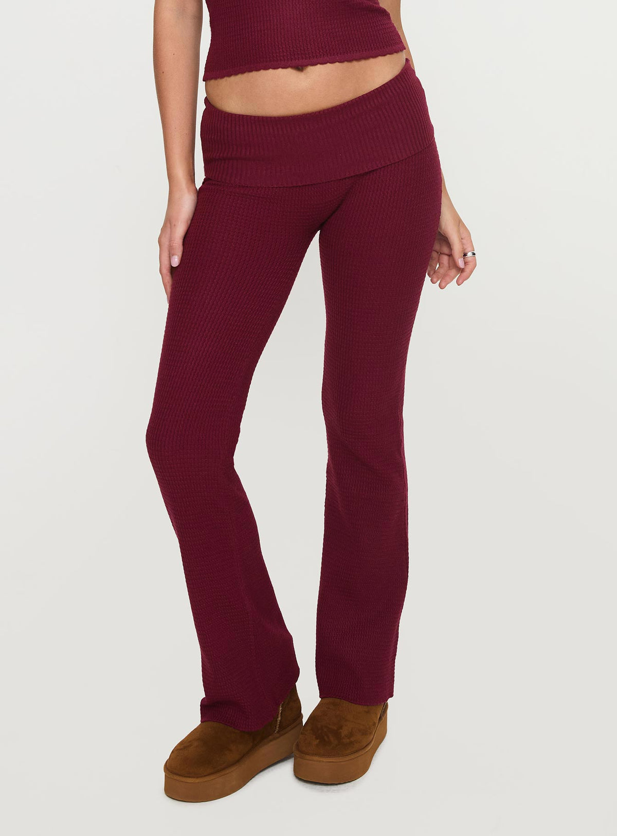 back view of model wearing Princess Polly Closed Eyes Flared Pants Maroon Low Rise Pants Pants 