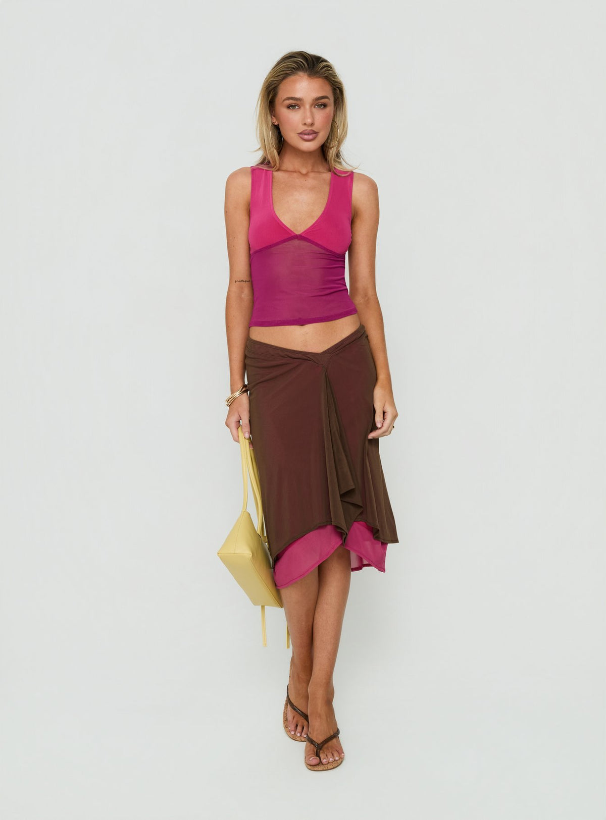 Discover the Erinhadi Midi Skirt Brown / Pink in womens-skirts with midi length front view of model wearing Princess Polly