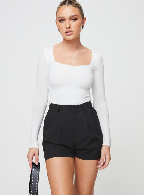 front view of model wearing Princess Polly Seize The Day Shorts Black High Waisted Shorts 