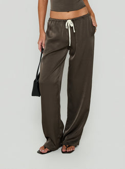 Featuring the Dialled Up Tie Waist Satin Pants Mocha in womens regular wide-leg silhouette with mid-rise belt side view of model wearing Princess Polly