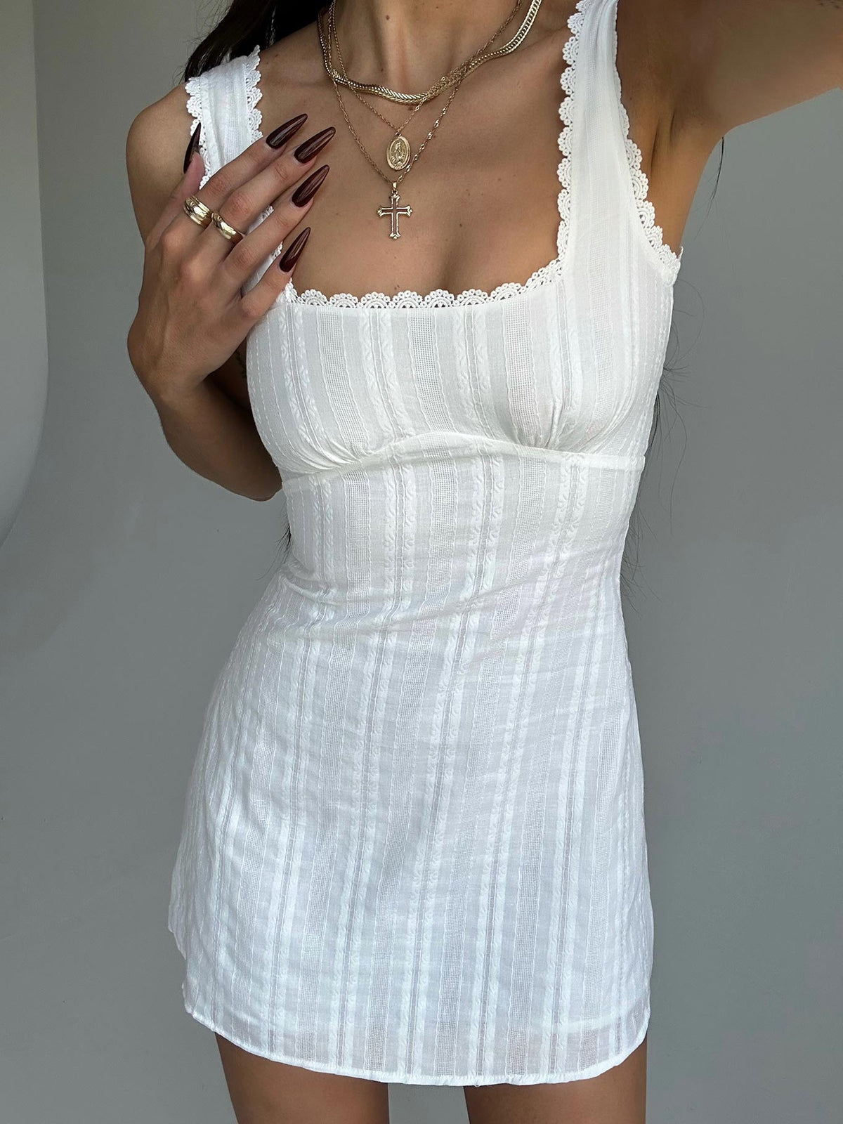 front view of model wearing Princess Polly Dasha Mini Dress White Lower Impact Square Neck 