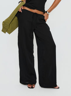 side view of model wearing Princess Polly Emorisa Mid Rise Chiffon Pant Black Mid Rise Pants Pants 