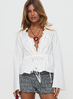 front view of model wearing Princess Polly Harloe Ruched Tie Up Long Sleeve Top White Full Sleeves V-Neck 