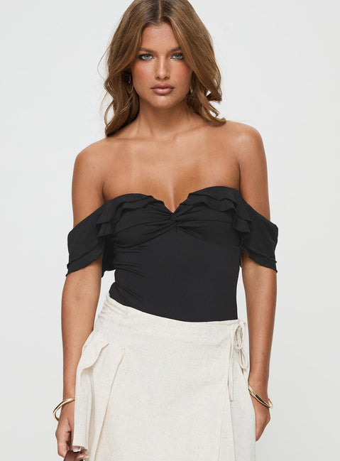front view of model wearing Princess Polly Coming Back Ruffle Bodysuit Black Sleeveless Bodysuit 