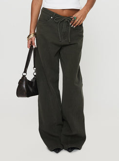 back view of model wearing Princess Polly Bruiser Tie Waist Mid Rise Wide Leg Jeans Green High Rise Jeans Jeans 
