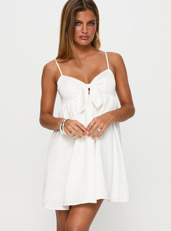side view of model wearing Princess Polly Wilmina Mini Dress White Sweetheart Neckline 
