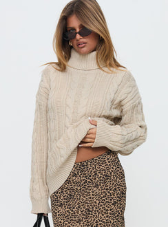 front view of model wearing Princess Polly Bryden Turtleneck Cable Knit Sweater Beige Longline Jumpers Jumpers 