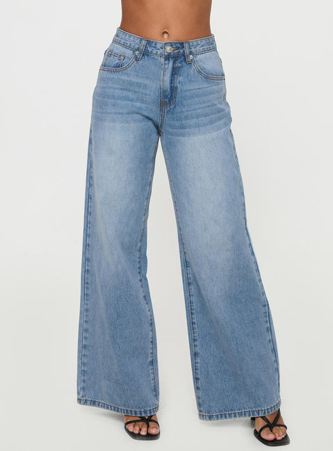 side view of model wearing Princess Polly Colemane Mid Rise Flared Jeans Angel Blue High Rise Jeans Jeans 