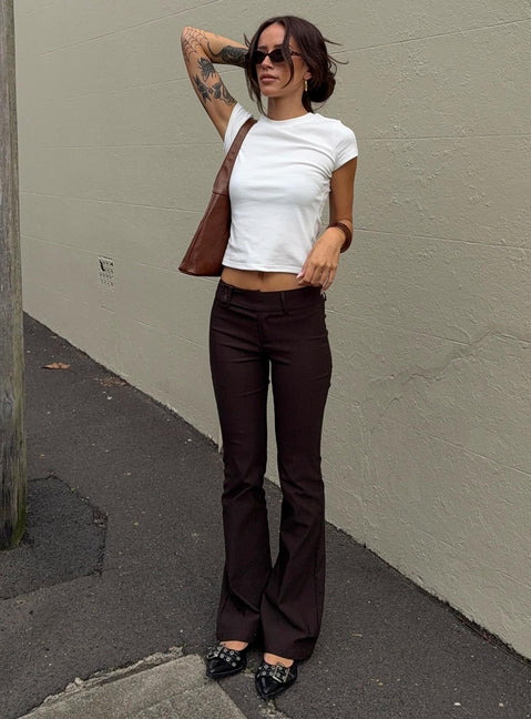 front view of model wearing Princess Polly Kinkirk Flared Pants Chocolate Tall Low Rise Pants Pants 