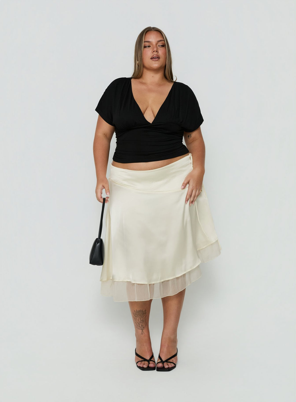 Featuring the Rosemead Satin Midi Skirt Cream Curve in womens-skirts with midi length detail view of model wearing