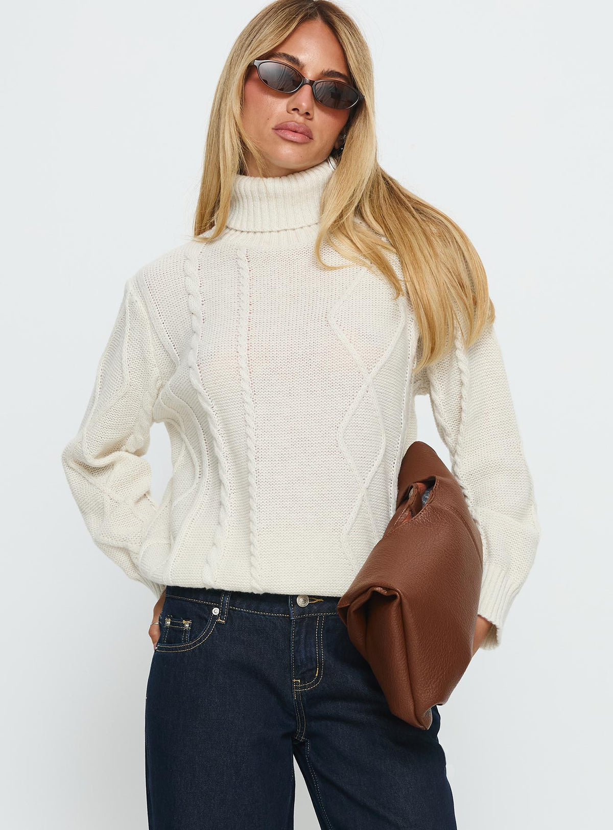 front view of model wearing Princess Polly Tarynne Cable Knit Turtle Neck Sweater Beige Longline Jumpers Jumpers 