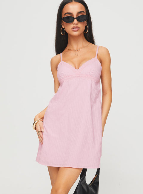 side view of model wearing Princess Polly Lunya Mini Dress Pink V-Neck 