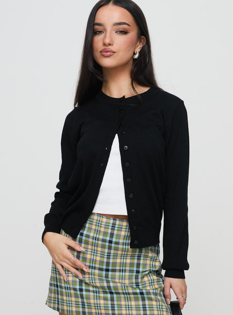 side view of model wearing Princess Polly Capeside Knit Cardigan Black Cropped Jumpers Jumpers 