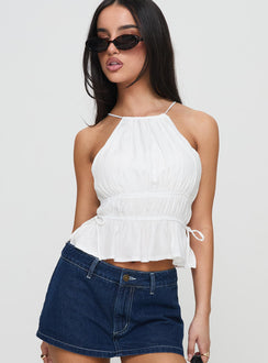 side view of model wearing Princess Polly Rozier Top White Sleeveless Crew Neck 