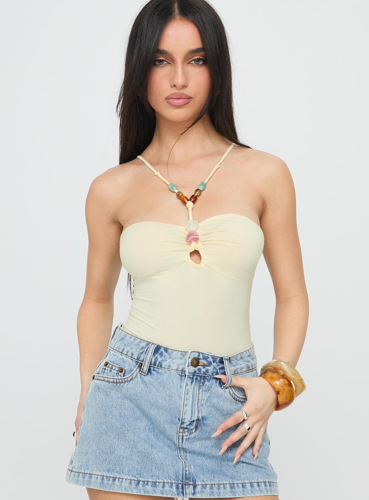 front view of model wearing Princess Polly Kianu Beaded Bodysuit Lemon Sleeveless Bodysuit 