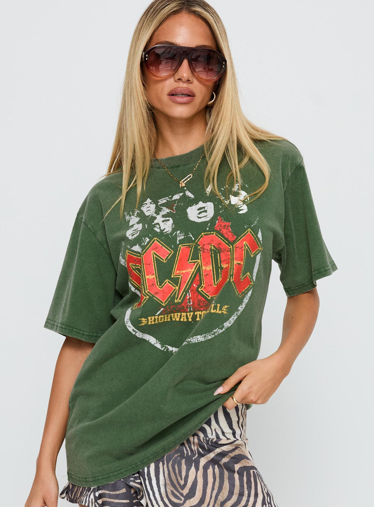 front view of model wearing Princess Polly Acdc Vintage Oversized Graphic Top Green Half Sleeves Crew Neck 