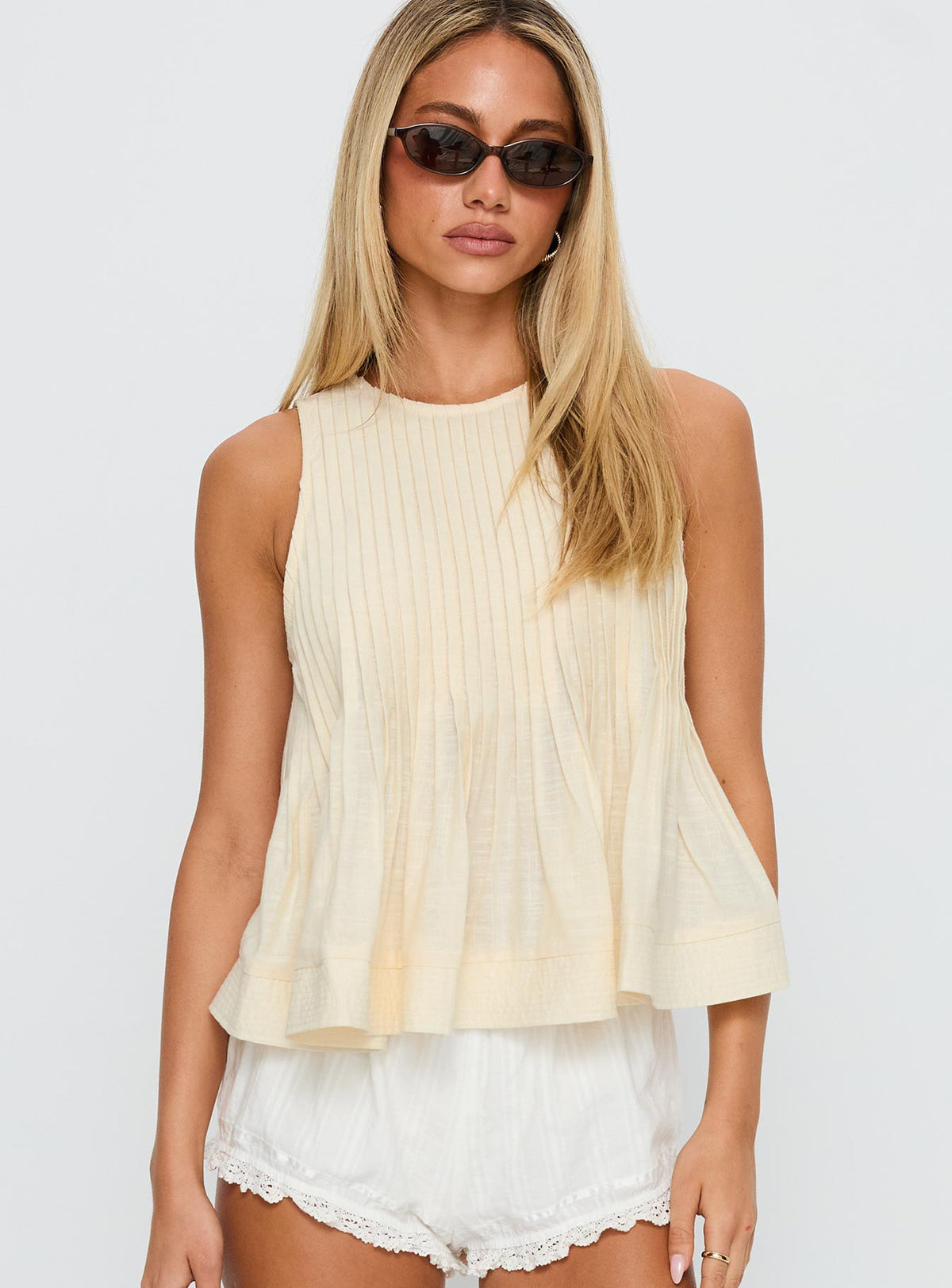 front view of model wearing Princess Polly Lavish Life Top Beige Sleeveless Crew Neck 