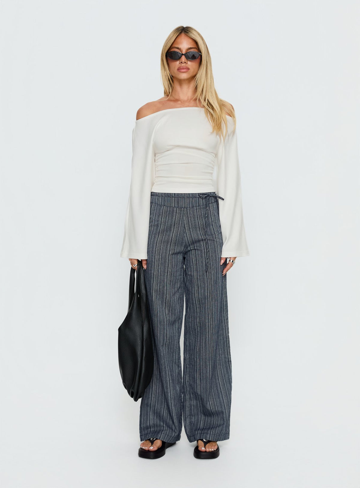 front view of model wearing Princess Polly Rush Hours Tie Up Pants Navy High Rise Pants Pants 