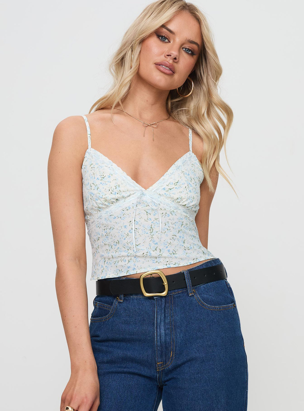 front view of model wearing Princess Polly Fondar Top Multi Floral Sleeveless Plunger 