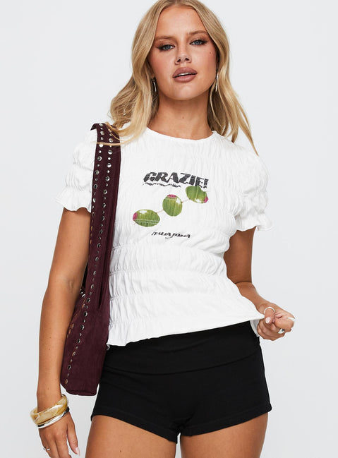 side view of model wearing Princess Polly Grazie Mille Shirred Graphic Top White / Green Short Sleeves Crew Neck 