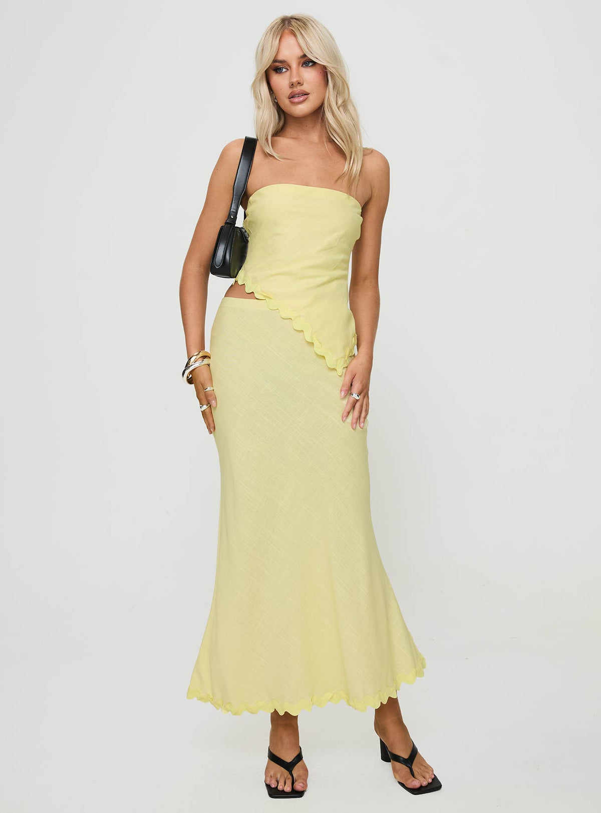   front view of model wearing Princess Polly Silvershore Maxi Skirt Yellow Maxi Skirts Skirts 