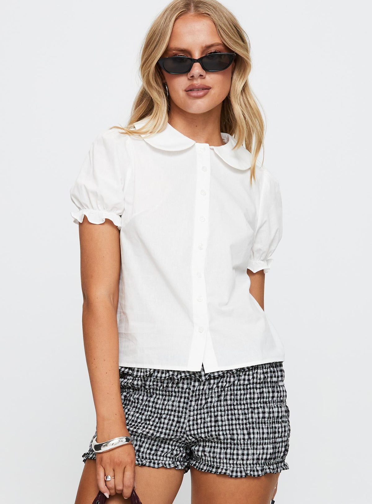 front view of model wearing Princess Polly Neverland Blouse Top White Short Sleeves Crew Neck 