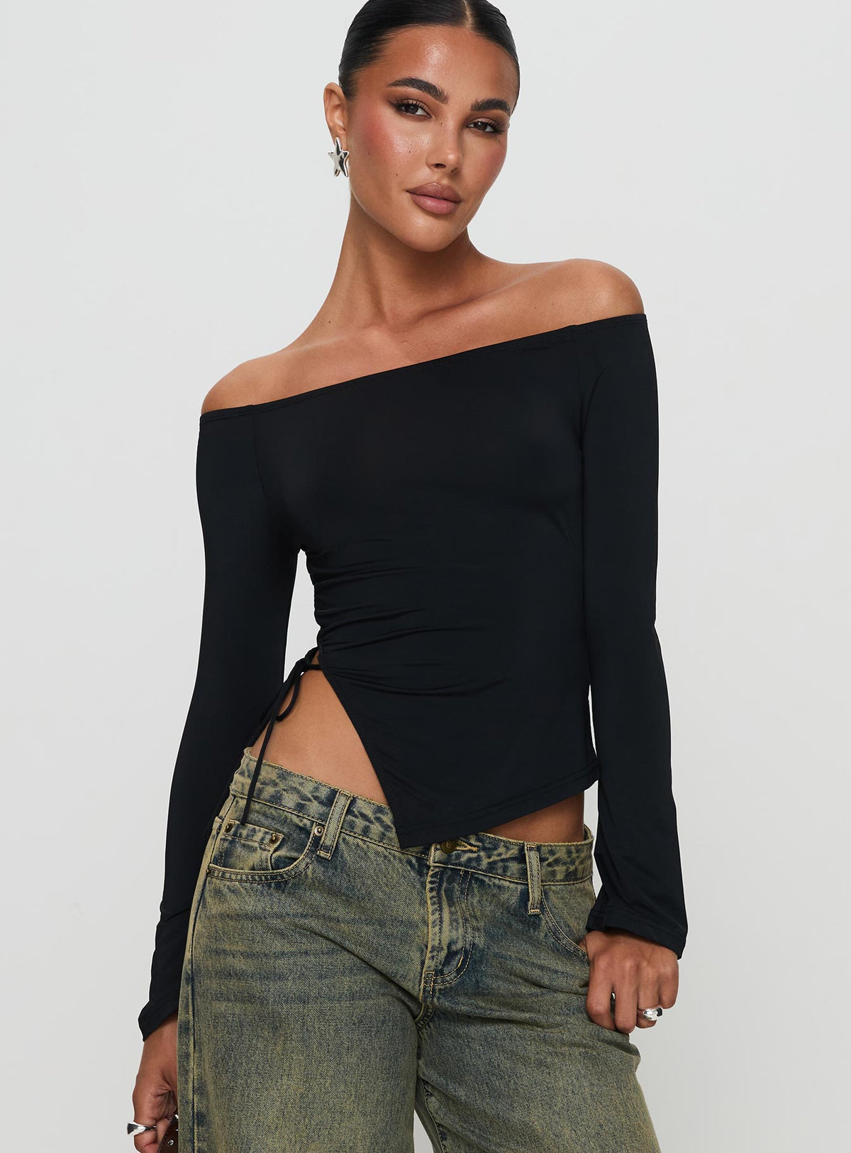 front view of model wearing Princess Polly Endellion Off Shoulder Long Sleeve Top Black Full Sleeves straight 