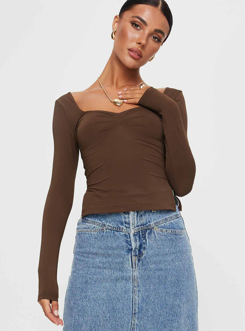 Front view of model wearing  front Princess Polly Full Sleeves Square Neck  Rehna Long Sleeve Top Brown
