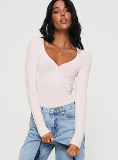 front view of model wearing Princess Polly Delgado Long Sleeve Bodysuit Pink Long Sleeve Tops Bodysuit 