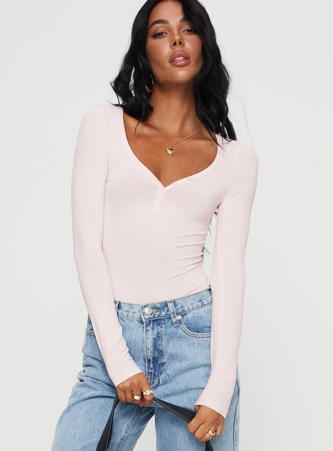 front view of model wearing Princess Polly Delgado Long Sleeve Bodysuit Pink Long Sleeve Tops Bodysuit 