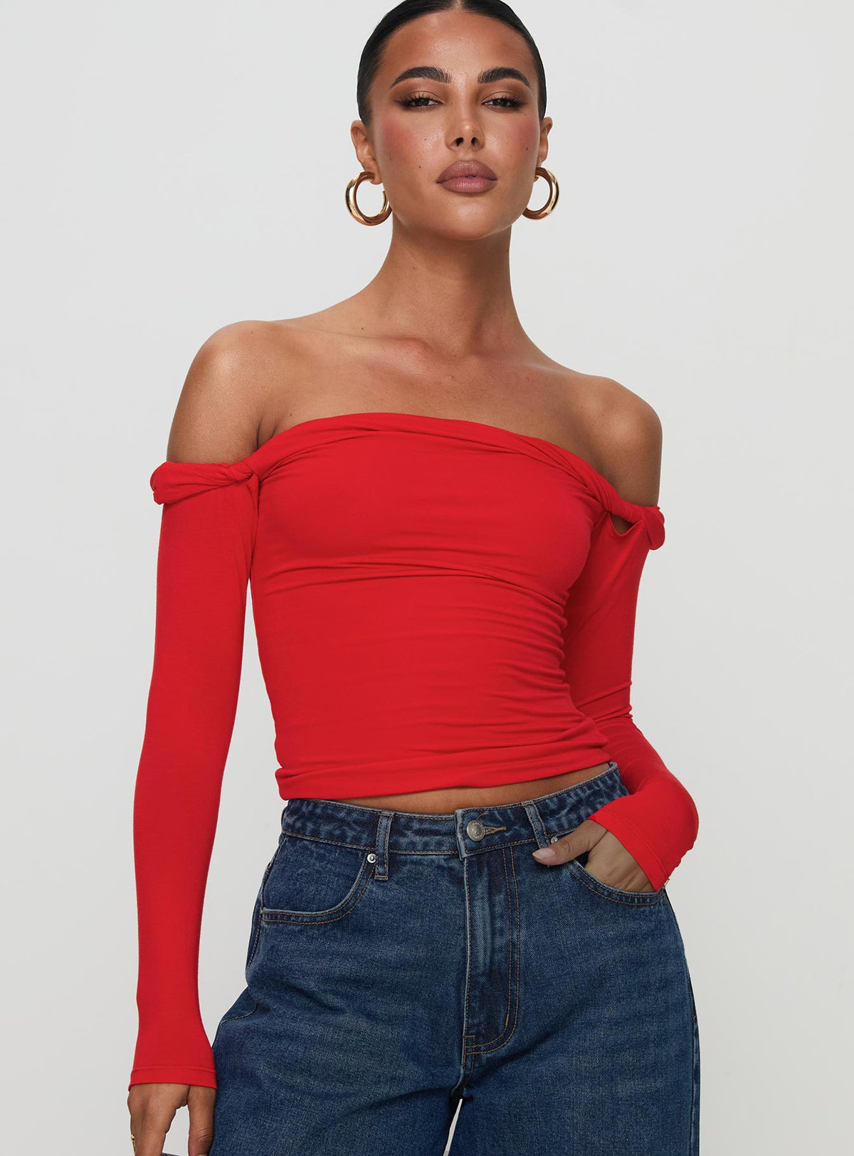 front view of model wearing Princess Polly Dusky Long Sleeve Top Red Full Sleeves straight 
