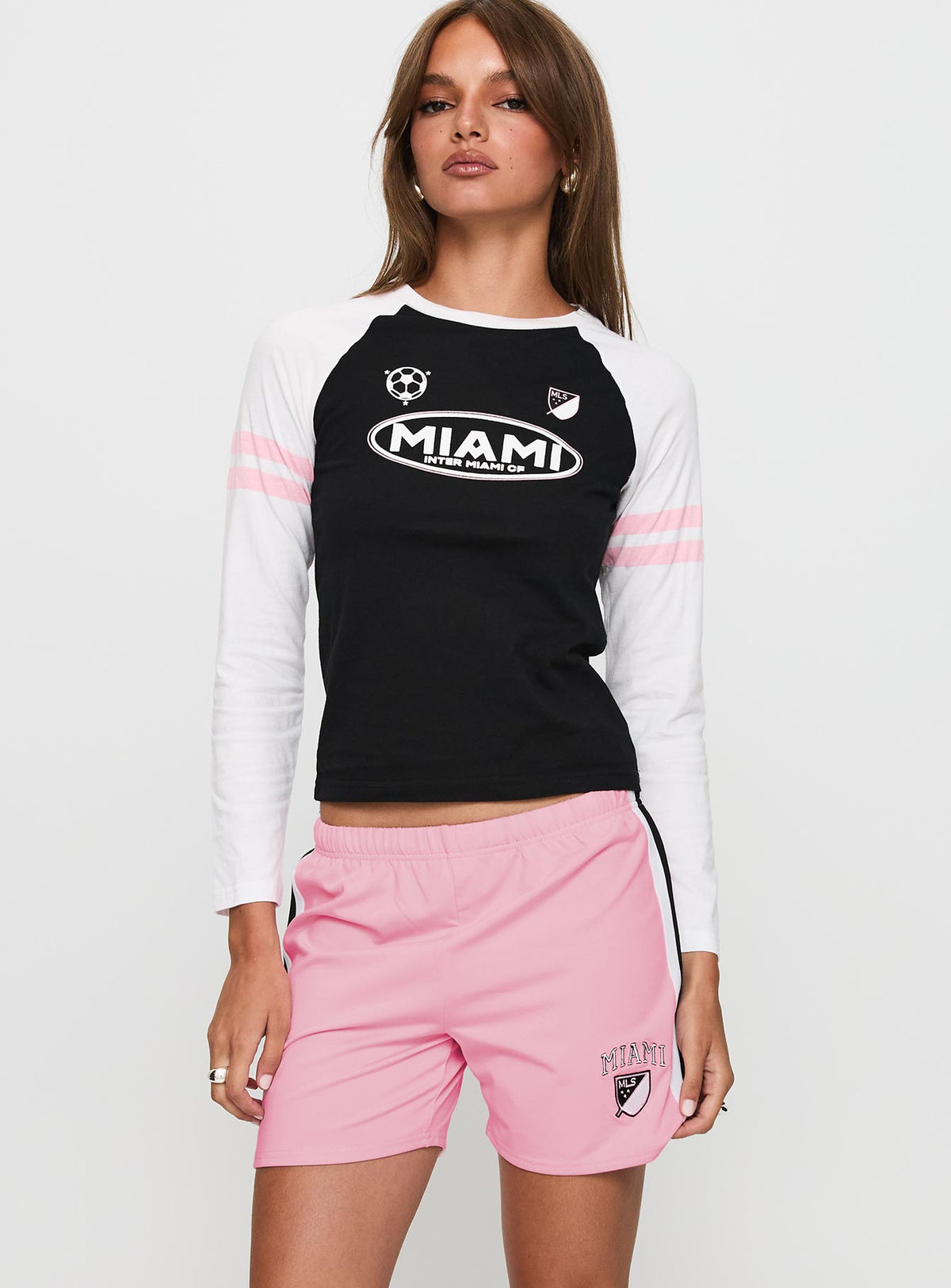 front view of model wearing Princess Polly Bend It Athletic Shorts Pink Low Rise Shorts 