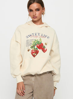 front view of model wearing Princess Polly Sweet Life Graphic Sweater Cream Longline Jumpers Jumpers 