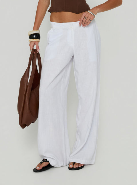 Featuring the Syrena Tailored Wide Leg Pant White in womens regular pants with high-rise detail view of model wearing Princess Polly