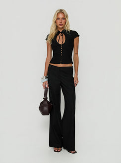 Showcasing Agazia No Waist Low Rise Straight Pants Black in womens regular pants front view of model wearing