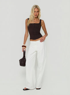 Featuring the Agazia No Waist Low Rise Straight Pants White in womens regular pants with low-rise front view of model wearing