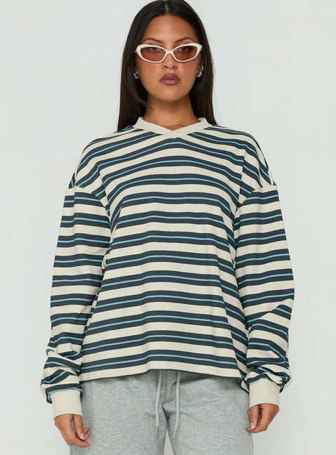 Showcasing the Opollo V Neck Jumper Blue Multi Stripe womens-jumpers with short length front view of model wearing Princess Polly