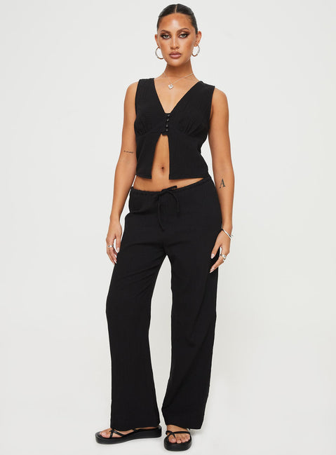 front view of model wearing Princess Polly Zanzibar Pants Black Low Rise Pants Pants 