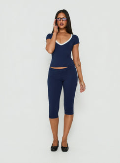 Experience the Rowanna Sporty Capri Pants Navy / Cream womens-regular-pants with high-rise front view of model wearing Princess Polly