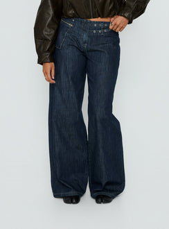 back view of model wearing Princess Polly Paltrow Mid Rise Wide Leg Cargo Jeans Dark Blue Wash Mid Rise Jeans Jeans 