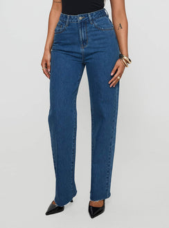 side view of model wearing Princess Polly Kalinda High Rise Straight Leg Jeans Mid Blue High Rise Jeans Jeans 